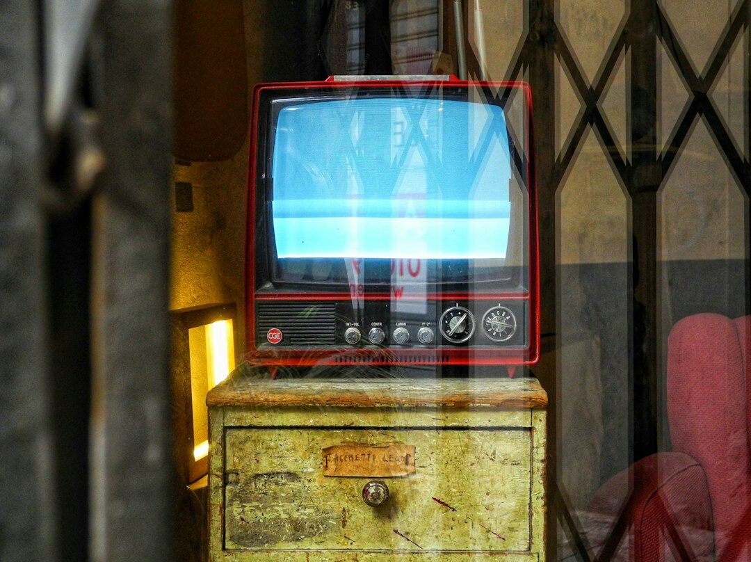 Vintage television broadcasting a colourful retro advertisement